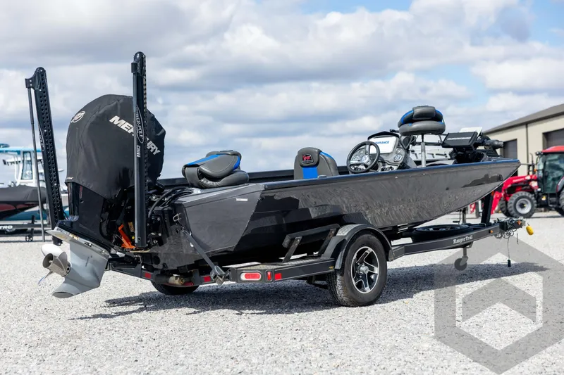 Slide: The Image of 2020 Ranger RT188P fishing boat on trailer, featuring Mercury engine, parked outdoors. - 5