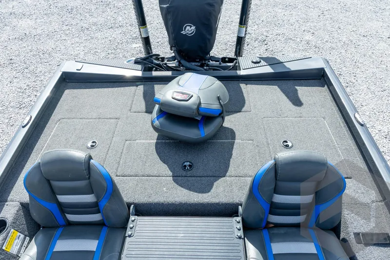 Slide: The Image of 2020 Ranger RT188P boat interior with gray and blue seating on a carpeted deck. - 51