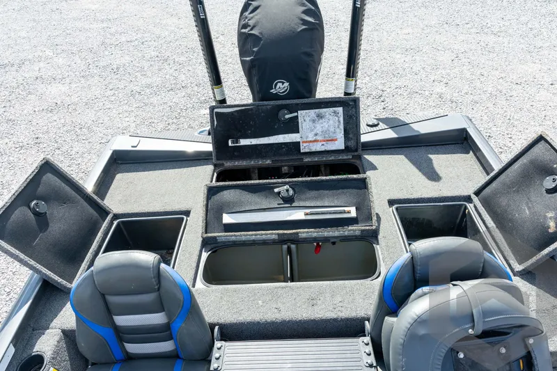 Slide: The Image of 2020 Ranger RT188P boat interior with open storage compartments and seating. - 52