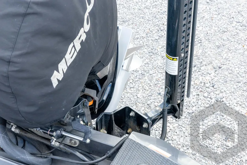 Slide: The Image of 2020 Ranger RT188P boat motor and mount on gravel surface. - 58