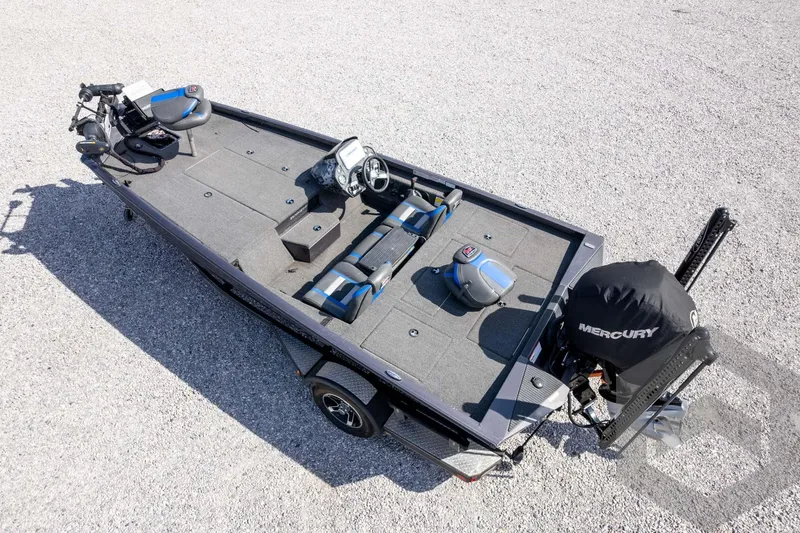 Slide: The Image of 2020 Ranger RT188P fishing boat with Mercury engine on gravel surface. - 63