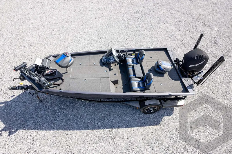 Slide: The Image of 2020 Ranger RT188P fishing boat with seating and equipment on gravel surface. - 64