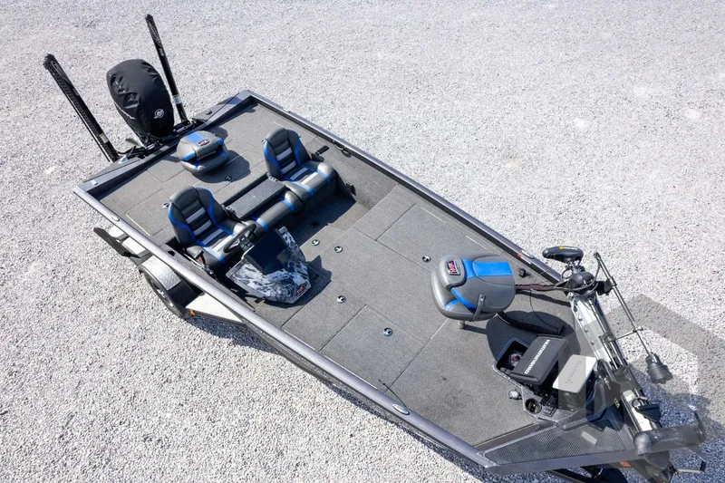 Slide: The Image of 2020 Ranger RT188P fishing boat with dual seats and trolling motor on gravel. - 67