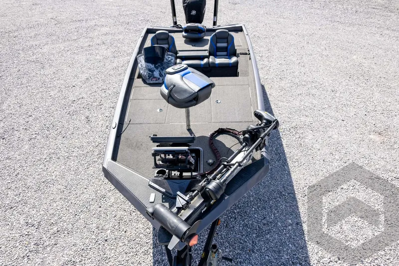 Slide: The Image of 2020 Ranger RT188P fishing boat on gravel, featuring seating and equipment. - 71
