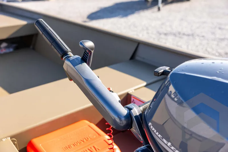 Slide: The Image of 2026 G3 Gator Tough 1548 VBW boat motor and throttle control close-up. - 20