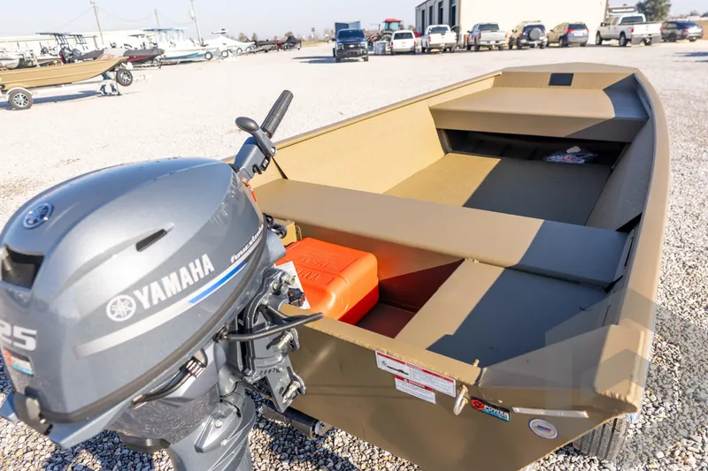 Slide: The Image of 2026 G3 Gator Tough 1548 VBW boat with Yamaha outboard motor in a gravel lot. - 23