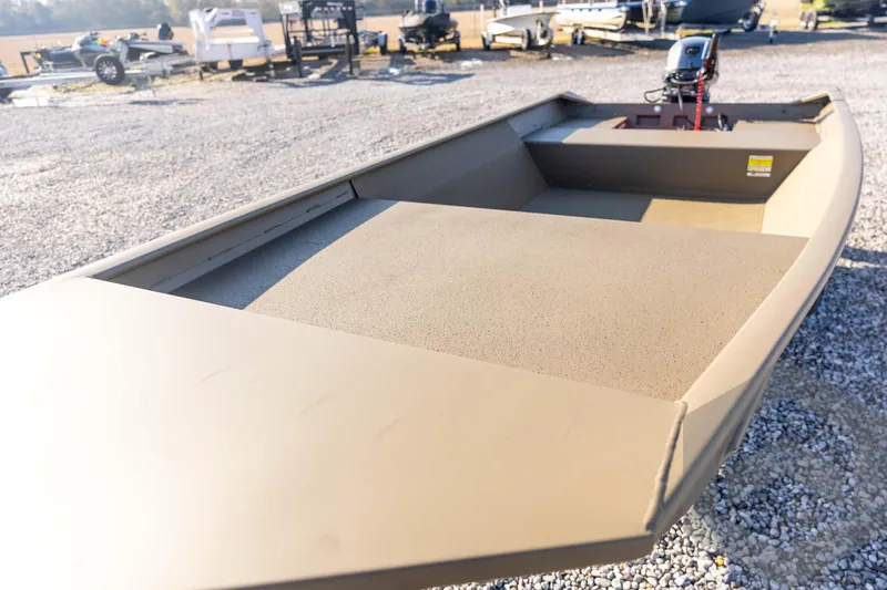 Slide: The Image of 2026 G3 Gator Tough 1548 VBW boat on gravel lot, showcasing spacious interior. - 24