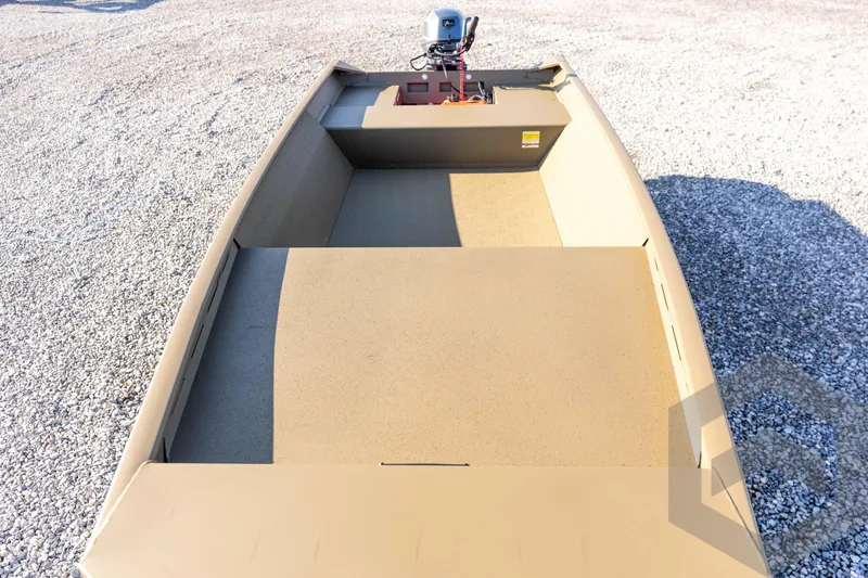 Slide: The Image of 2026 G3 Gator Tough 1548 VBW boat on gravel surface, interior view. - 26