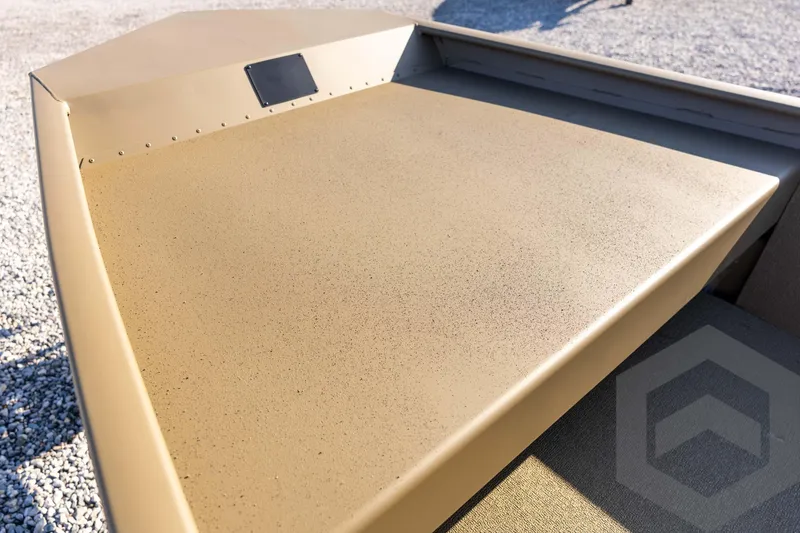 Slide: The Image of 2026 G3 Gator Tough 1548 VBW boat deck, beige finish, outdoor setting. - 29