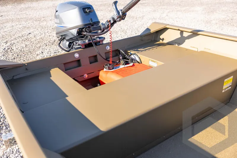 Slide: The Image of 2026 G3 Gator Tough 1548 VBW boat with Yamaha outboard motor on gravel. - 31