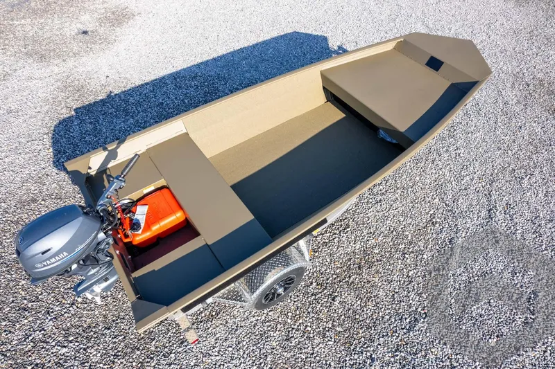 Slide: The Image of 2026 G3 Gator Tough 1548 VBW boat with Yamaha motor on gravel surface. - 36