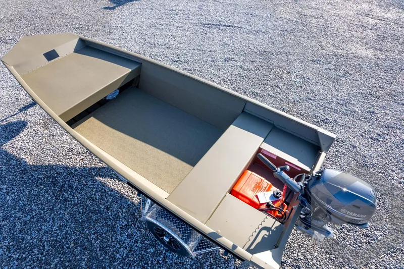 Slide: The Image of 2026 G3 Gator Tough 1548 VBW boat with Yamaha motor on gravel surface. - 38