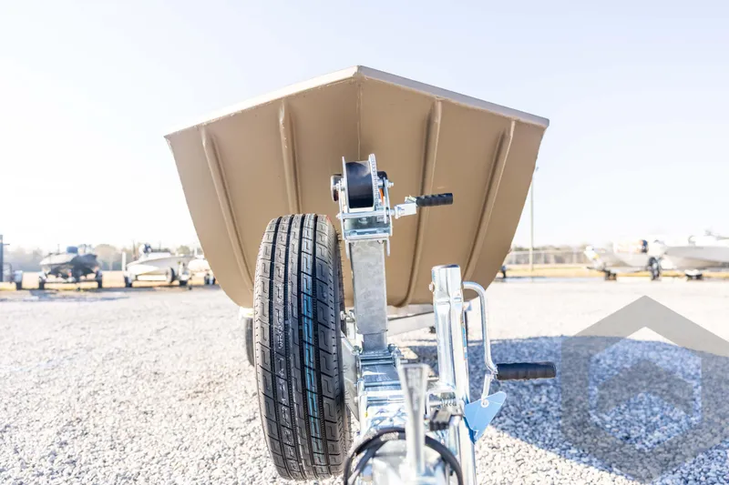 Slide: The Image of 2026 G3 Gator Tough 1548 VBW boat on trailer, front view, gravel lot. - 9