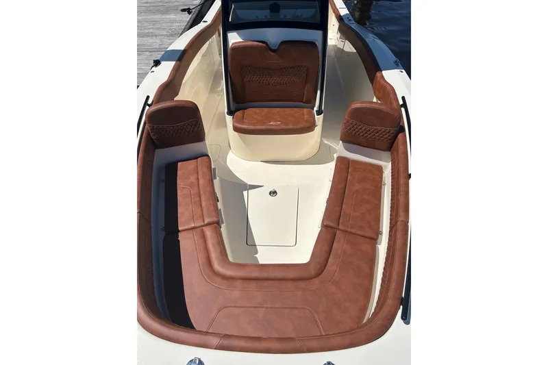 Slide: The Image of 2025 Scout 277 LXF boat interior with luxurious brown leather seating. - 39