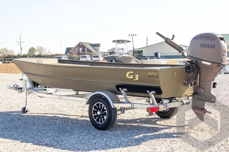 Slide: The Image of 2026 G3 Gator Tough 1652 VBW boat with Yamaha motor on trailer. - 18