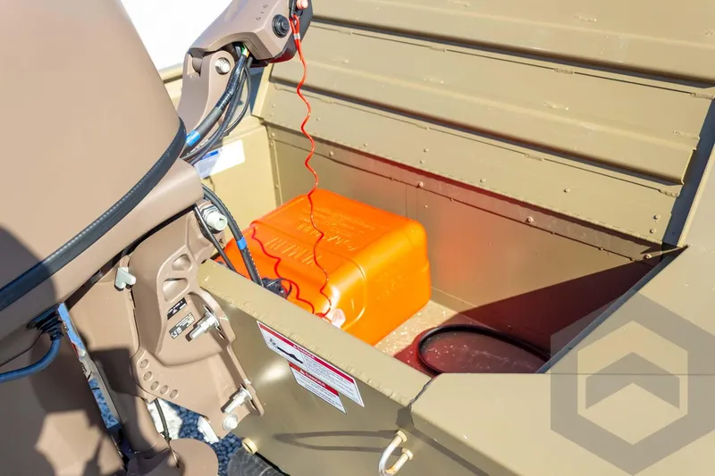 Slide: The Image of 2026 G3 Gator Tough 1652 VBW boat interior with orange fuel tank and motor details. - 26