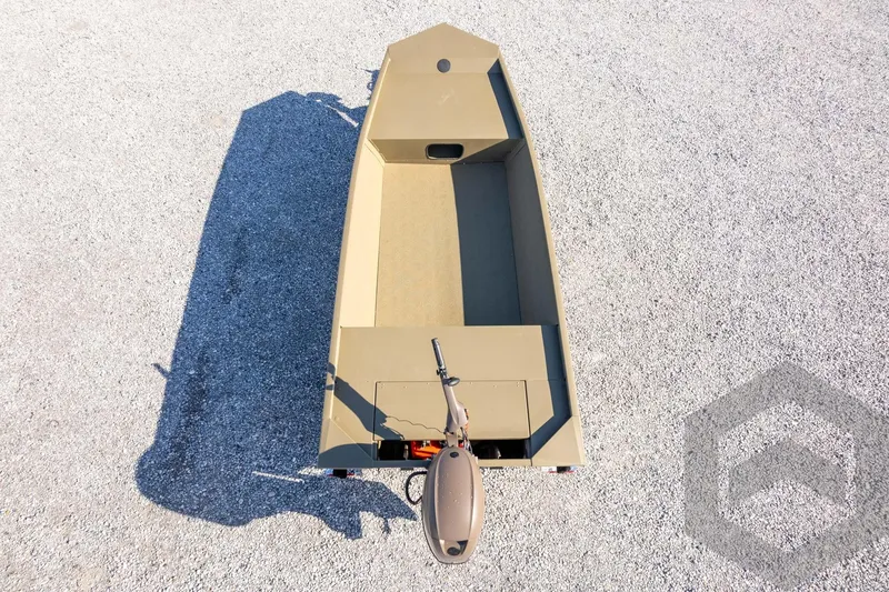 Slide: The Image of 2026 G3 Gator Tough 1652 VBW boat on gravel surface, top view. - 34