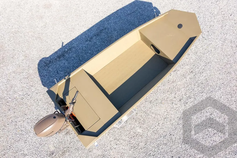 Slide: The Image of 2026 G3 Gator Tough 1652 VBW boat, aerial view on gravel surface. - 35