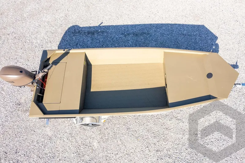 Slide: The Image of 2026 G3 Gator Tough 1652 VBW boat, aerial view on gravel surface. - 36