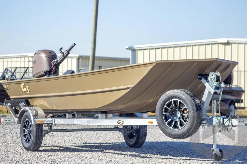 Slide: The Image of 2026 G3 Gator Tough 1652 VBW boat on trailer, outdoor display. - 7