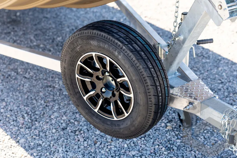 Slide: The Image of Trailer wheel of 2026 G3 Gator Tough 1860 VBW on gravel surface. - 10