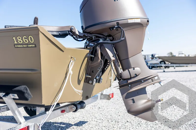 Slide: The Image of 2026 G3 Gator Tough 1860 VBW boat with Yamaha outboard motor on trailer. - 28