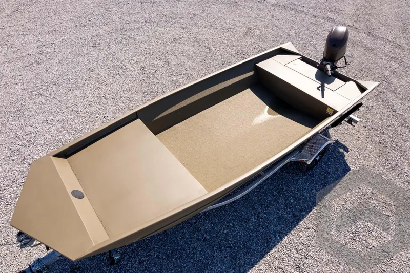 Slide: The Image of 2026 G3 Gator Tough 1860 VBW boat on gravel, featuring a durable design. - 36