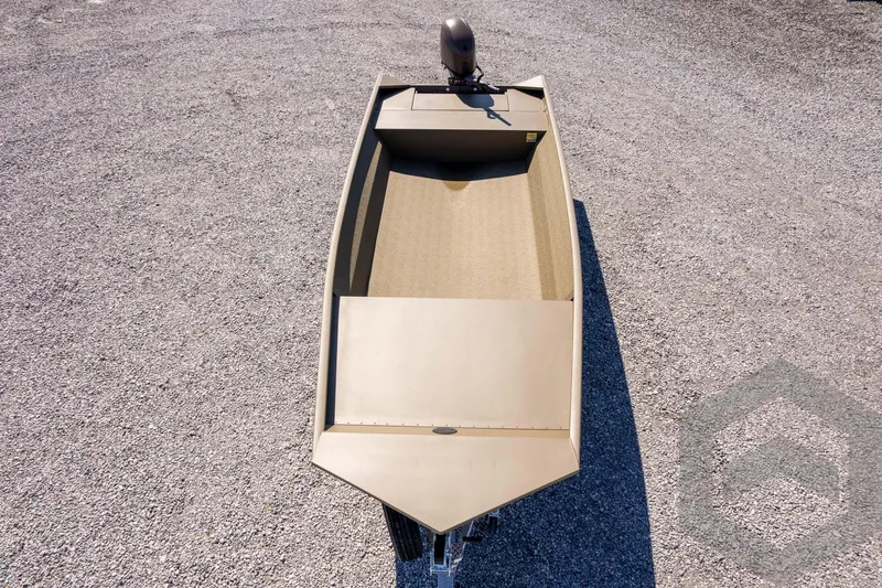 Slide: The Image of 2026 G3 Gator Tough 1860 VBW boat on gravel surface, top view. - 37