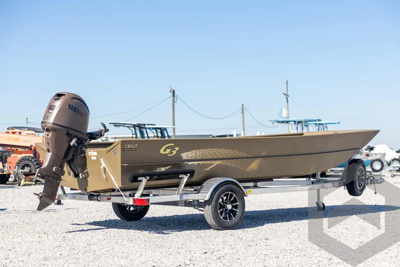 Slide: The Image of 2026 G3 Gator Tough 1860 VBW boat on trailer with Yamaha outboard motor. - 5