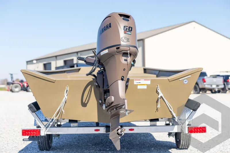 Slide: The Image of 2026 G3 Gator Tough 1860 VBW boat with Yamaha 60 outboard motor on trailer. - 6