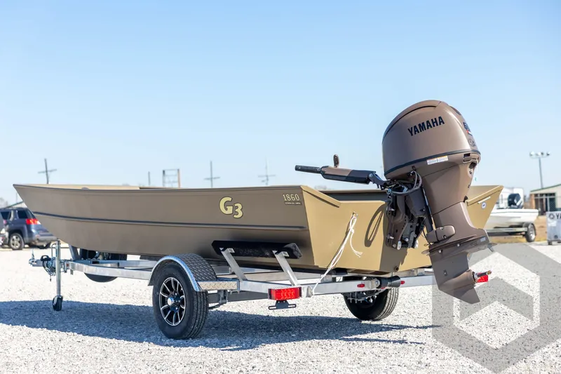 Slide: The Image of 2026 G3 Gator Tough 1860 VBW boat on trailer with Yamaha outboard motor. - 7