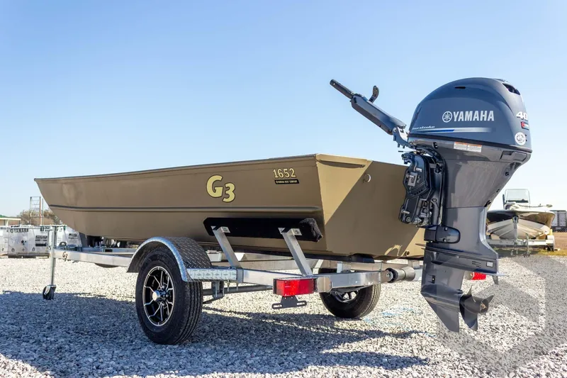 Slide: The Image of 2026 G3 Gator Tough 1652 VBW boat with Yamaha motor on trailer. - 16