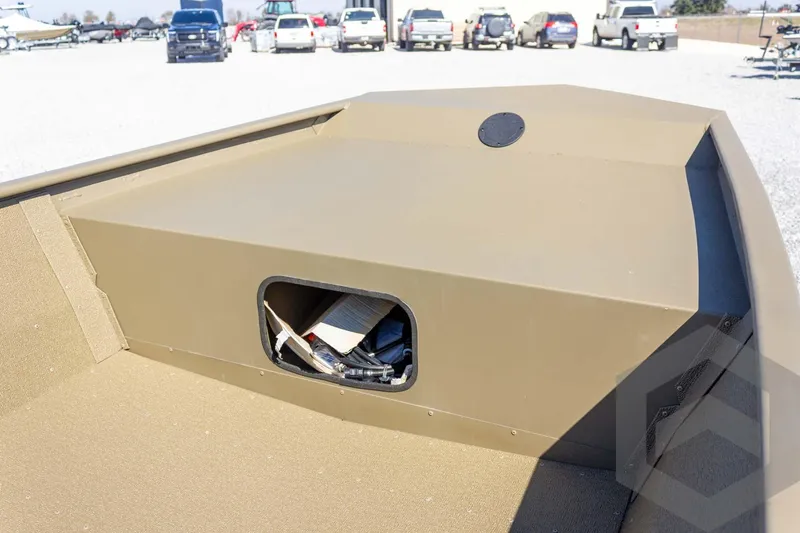 Slide: The Image of 2026 G3 Gator Tough 1652 VBW boat interior with storage compartment. - 23