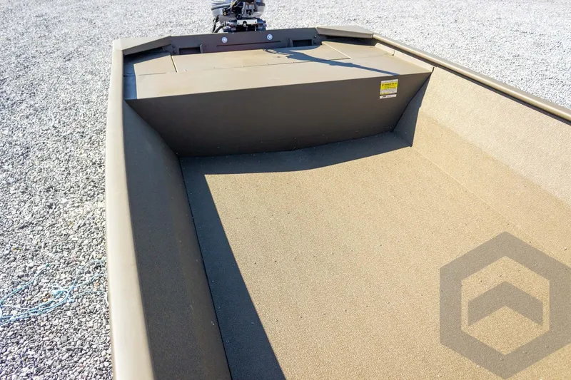 Slide: The Image of 2026 G3 Gator Tough 1652 VBW boat interior on gravel surface. - 26