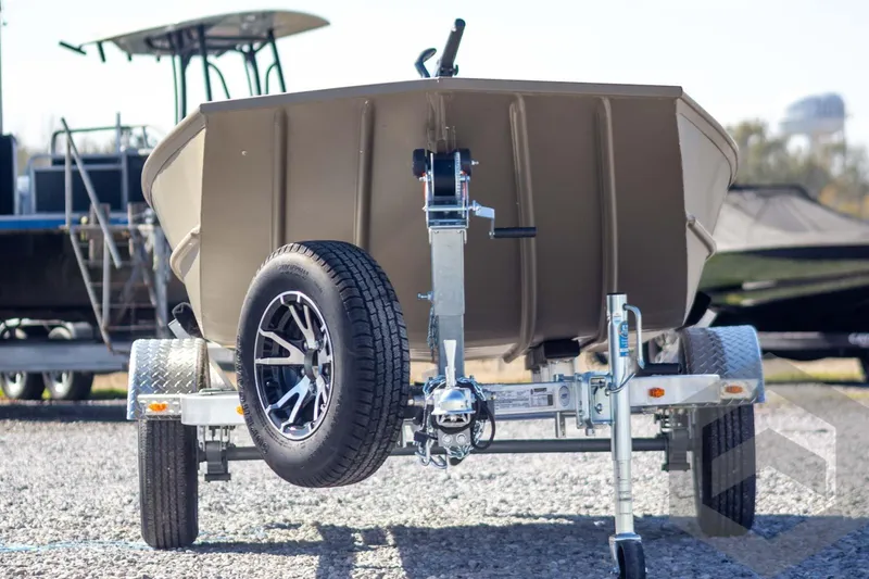 Slide: The Image of 2026 G3 Gator Tough 1652 VBW boat on trailer, front view, outdoors. - 3