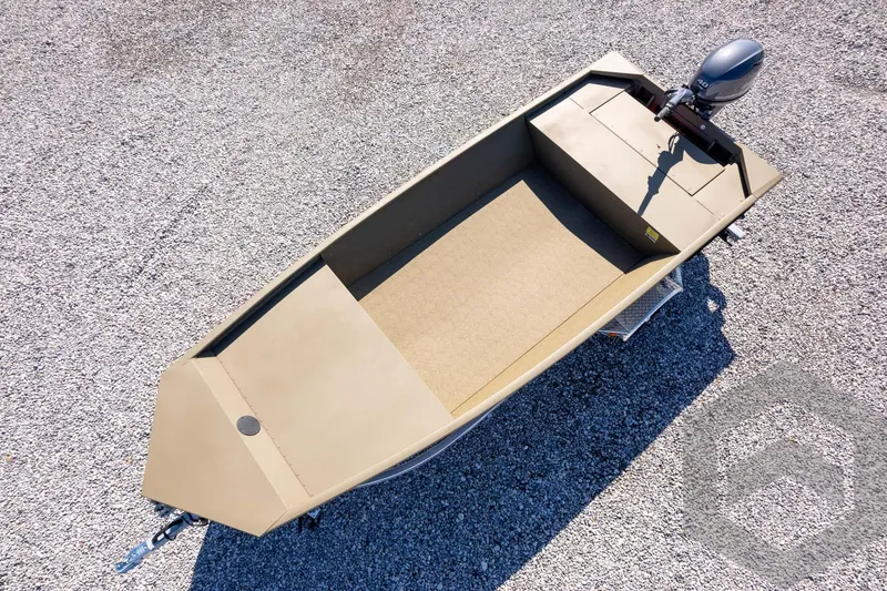 Slide: The Image of 2026 G3 Gator Tough 1652 VBW boat on gravel, aerial view. - 39