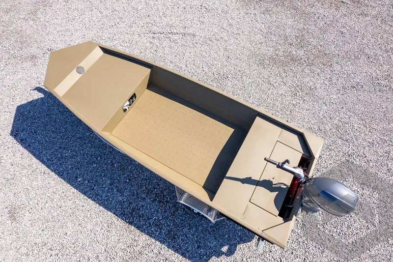 Slide: The Image of 2026 G3 Gator Tough 1652 VBW boat on gravel, top view. - 41