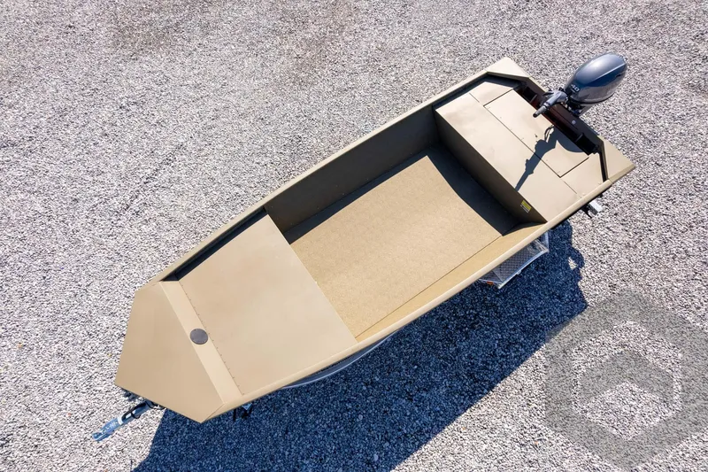 Slide: The Image of 2026 G3 Gator Tough 1652 VBW boat on gravel surface, aerial view. - 47