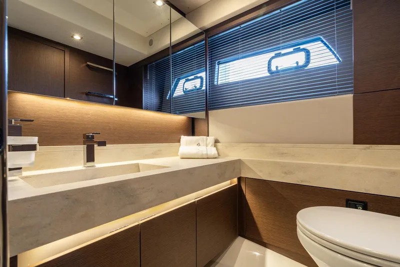 Slide: The Image of Luxurious bathroom interior of 2022 Prestige 520 yacht with modern fixtures and elegant design. - 13