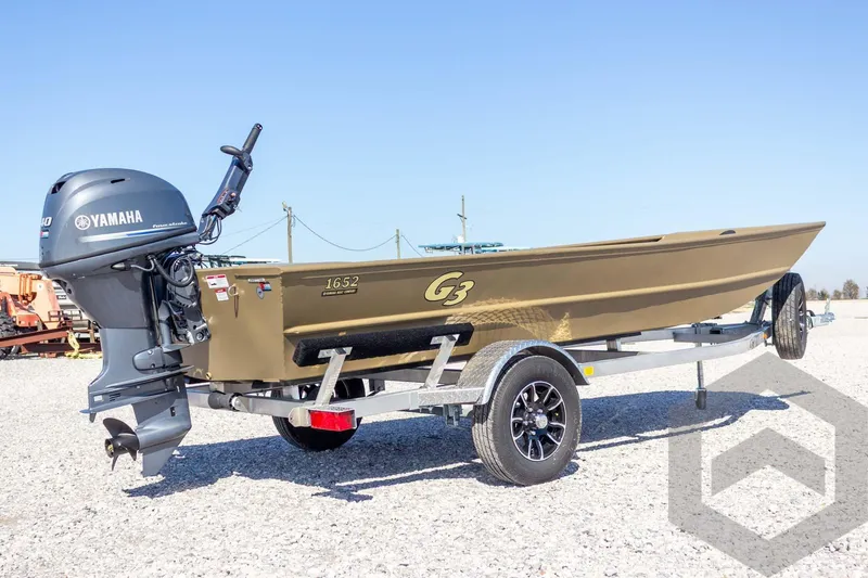 Slide: The Image of 2026 G3 Gator Tough 1652 VBW boat on trailer with Yamaha outboard motor. - 14