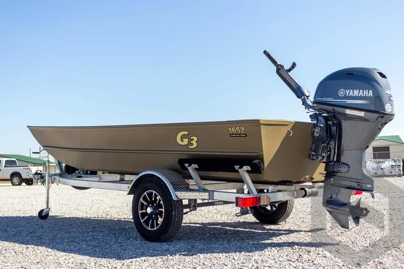 Slide: The Image of 2026 G3 Gator Tough 1652 VBW boat with Yamaha motor on trailer. - 16