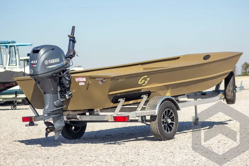 Slide: The Image of 2026 G3 Gator Tough 1652 VBW boat with Yamaha motor on trailer. - 7