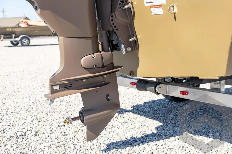 Slide: The Image of 2026 G3 Gator Tough 1860 VBW boat motor detail on gravel surface. - 13