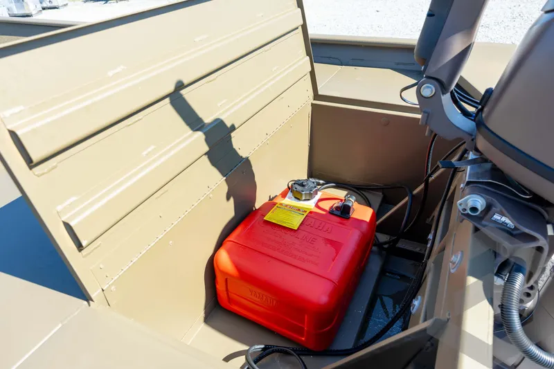 Slide: The Image of 2026 G3 Gator Tough 1860 VBW boat interior with red fuel tank. - 19