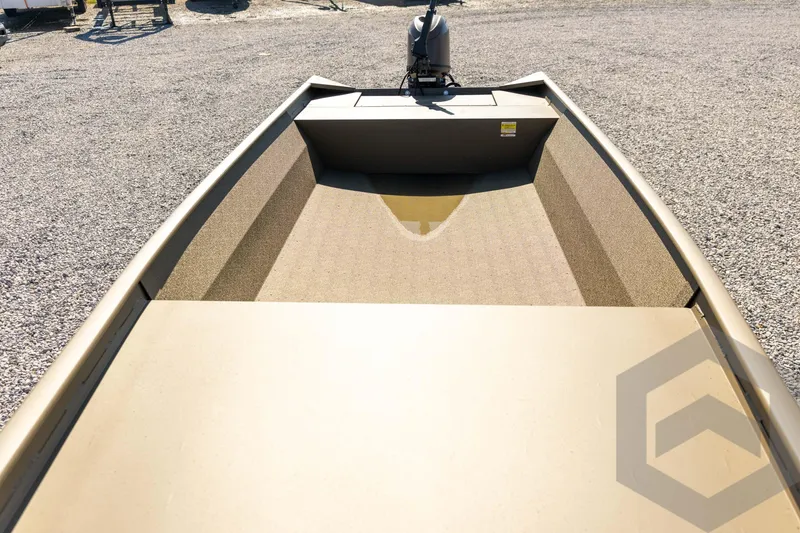 Slide: The Image of 2026 G3 Gator Tough 1860 VBW boat, spacious deck, gravel background. - 22