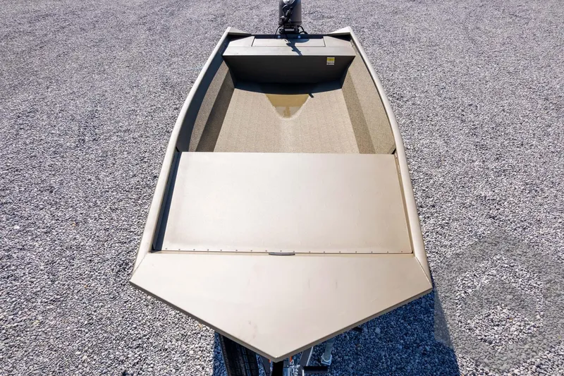 Slide: The Image of 2026 G3 Gator Tough 1860 VBW boat on gravel surface, top view. - 35
