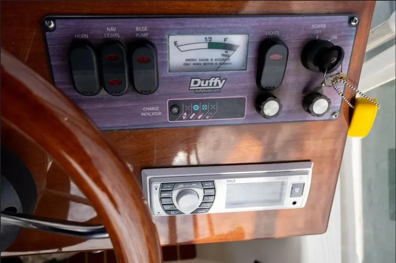 Slide: The Image of 2014 Duffy 22 Bay Island boat at sunset, privately owned, with Marina Pacifica slip. - 5