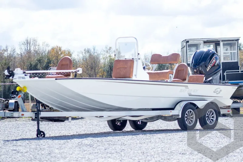 The Image of 2026 G3 Bay 22 GX boat on trailer, featuring sleek design and powerful engine. - 1