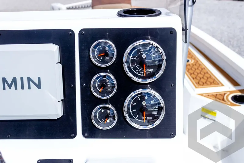 Slide: The Image of Dashboard of 2026 G3 Bay 22 GX boat with gauges and Garmin device. - 47