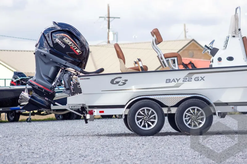 Slide: The Image of 2026 G3 Bay 22 GX boat with Yamaha engine on a trailer. - 5